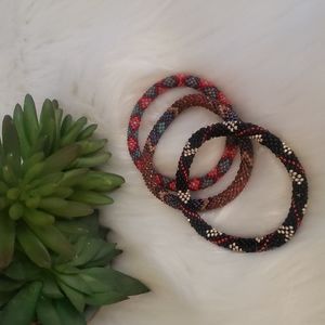 Bundle of handmade bead slip on bracelets